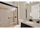 Modern bathroom featuring a glass-enclosed shower, stylish vanity, and contemporary fixtures at 2120 Gwynhurst Blvd, Wesley Chapel, FL 33543