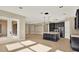 Large kitchen with modern stainless steel appliances, dark cabinets and an island at 2120 Gwynhurst Blvd, Wesley Chapel, FL 33543