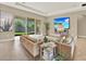 Living room with comfortable seating, neutral paint and outdoor access at 2120 Gwynhurst Blvd, Wesley Chapel, FL 33543