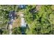Top-down aerial view of the property, highlighting the layout and surrounding green space at 2121 Odessa Gardens Ln, Odessa, FL 33556