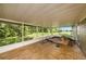 This home features a screened in patio with views of the back yard at 2121 Odessa Gardens Ln, Odessa, FL 33556