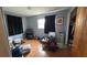 Bedroom features wood laminate flooring, a window, and a closet at 2410 38Th N Ave, St Petersburg, FL 33713