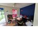 This bedroom features natural light and laminate flooring at 2410 38Th N Ave, St Petersburg, FL 33713
