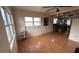Spacious living room features hardwood floors, ceiling fan, and lots of natural light at 2410 38Th N Ave, St Petersburg, FL 33713