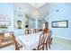 Spacious dining area with elegant decor, chandelier lighting, and a seamless transition into the living spaces at 2504 Oak Landing Dr, Brandon, FL 33511