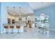 Spacious kitchen with granite countertops, stainless steel appliances, and breakfast bar seating at 2504 Oak Landing Dr, Brandon, FL 33511