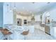 Open kitchen featuring an island with seating, stainless steel appliances and a breakfast nook at 2504 Oak Landing Dr, Brandon, FL 33511