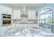 Modern kitchen with granite countertops, stainless steel appliances, and an undermount sink at 2504 Oak Landing Dr, Brandon, FL 33511