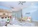 Open-concept living room with kitchen view, light blue walls, and lots of space at 2504 Oak Landing Dr, Brandon, FL 33511