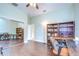 Office space featuring hardwood floors, a mirrored closet, and ample desk and shelving space at 2504 Oak Landing Dr, Brandon, FL 33511