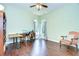 Spacious office with hardwood floors, a ceiling fan, and a decorative arm chair at 2504 Oak Landing Dr, Brandon, FL 33511