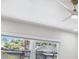 Close up of a stylish ceiling fan in a room with white walls and natural light at 3197 Walnut Ne St, St Petersburg, FL 33704