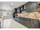 Sleek modern kitchen featuring stylish cabinetry, stainless steel appliances, and marble accents at 3197 Walnut Ne St, St Petersburg, FL 33704