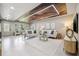 Bright living room boasts stylish furnishings, eye-catching ceiling, and large windows at 3197 Walnut Ne St, St Petersburg, FL 33704