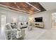 Comfortable living room featuring a modern ceiling design, ample seating, and neutral tones at 3197 Walnut Ne St, St Petersburg, FL 33704