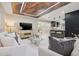 Inviting living room featuring a modern ceiling design, bar seating, and dining area at 3197 Walnut Ne St, St Petersburg, FL 33704