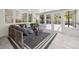 Bright sunroom features stylish seating and seamless access to the pool area at 3197 Walnut Ne St, St Petersburg, FL 33704