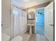Bathroom with shower, vanity and view into an adjacent bedroom at 3327 25Th N St, St Petersburg, FL 33713