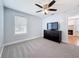 Bedroom with ceiling fan, natural light and view to a fireplace at 3327 25Th N St, St Petersburg, FL 33713