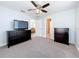 Bedroom with gray walls, light carpet and open floor plan to other rooms at 3327 25Th N St, St Petersburg, FL 33713