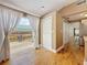 Dining area featuring french doors to outdoor deck, with access to kitchen and hall closet at 3327 25Th N St, St Petersburg, FL 33713