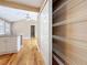 Walk-in pantry with multiple metal storage shelves; view into kitchen area at 3327 25Th N St, St Petersburg, FL 33713