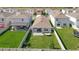 Aerial view of a backyard featuring a covered patio and a hammock at 34033 Jasper Stone Dr, Wesley Chapel, FL 33543