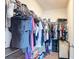 Walk-in closet with ample hanging space, wire shelving, and convenient floor storage at 34033 Jasper Stone Dr, Wesley Chapel, FL 33543