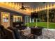 Inviting covered patio with outdoor seating and entertaining space at 3620 Little Rd, Lutz, FL 33548