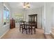 Elegant dining room featuring a classic dining set and natural light from large windows at 389 Grand Bay Dr, Palm Harbor, FL 34683