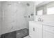 Updated bathroom features a marble tiled shower and stylish vanity at 4015 Overlook Ne Dr, St Petersburg, FL 33703