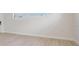 An empty bedroom showcasing natural light, light-colored walls and clean and modern flooring at 4015 Overlook Ne Dr, St Petersburg, FL 33703