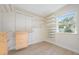 Walk-in closet with custom shelving and storage solutions at 4015 Overlook Ne Dr, St Petersburg, FL 33703
