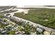 Waterfront homes with private docks enjoy boat access to scenic waterways and lush mangrove shoreline at 4157 Marine Pkwy, New Port Richey, FL 34652