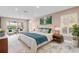 Bright main bedroom with access to a screened-in lanai, and natural light at 4157 Marine Pkwy, New Port Richey, FL 34652