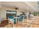 Covered patio and seating area overlooking the serene water view at 4157 Marine Pkwy, New Port Richey, FL 34652