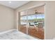 Brick patio overlooking pool; accessible from interior by sliding glass doors at 4157 Marine Pkwy, New Port Richey, FL 34652