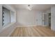 Bright bedroom with wood floors and a modern light fixture at 4441 16Th N St, St Petersburg, FL 33703