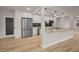 Modern kitchen featuring granite countertops, stainless steel appliances, and white cabinetry at 4441 16Th N St, St Petersburg, FL 33703