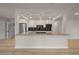 Bright, open kitchen featuring granite countertops and pendant lights at 4441 16Th N St, St Petersburg, FL 33703