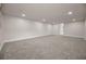 Spacious living room with plush carpeting and recessed lighting at 4441 16Th N St, St Petersburg, FL 33703