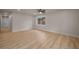 Spacious living room featuring modern ceiling fan, recessed lighting and wood-look floors at 4441 16Th N St, St Petersburg, FL 33703