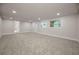 Large living room featuring neutral walls, and a door to the backyard at 4441 16Th N St, St Petersburg, FL 33703