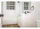 Updated bathroom with a new vanity, modern fixtures, and tiled walls at 4611 W 18Th Ave, Bradenton, FL 34209