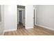 Bright bedroom with neutral walls and wood-look flooring at 4611 W 18Th Ave, Bradenton, FL 34209