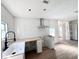 Bright kitchen with white subway tile, butcher block countertops, and stainless steel hood at 4701 17Th S Ave, St Petersburg, FL 33711