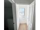 Bright laundry room features a window, new flooring, and fresh paint at 4701 17Th S Ave, St Petersburg, FL 33711