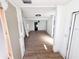 Open living room featuring new flooring and freshly painted white walls, ready for personalization at 4701 17Th S Ave, St Petersburg, FL 33711