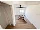 Bright living room with wood flooring and a ceiling fan offers a comfortable and inviting space at 4701 17Th S Ave, St Petersburg, FL 33711