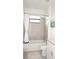 Bathroom with a bathtub, shower combo, granite countertop, and a white vanity at 4957 Seafoam Trl, Bradenton, FL 34211
